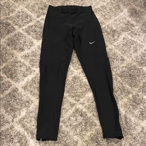 Nike running tights with zippers